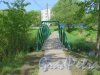Пешеходный мост через искусственный разлив реки Ижора для Бумажной фабрики Коммунар. фото май 2016 г. 