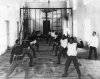 Урок фехтования в гимнастическом зале Гатчинского сиротского института императора Николая I. Фото начала XX века.