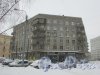 Кондратьевский проспект, дом 33, литера А. Угловая часть здания на углу переулка Усыскина и улицы Васенко. Фото 26 февраля 2018 года.