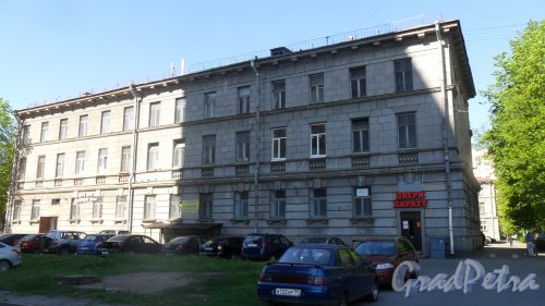 Проспект Пархоменко, дом 49. Вид здания от площади Мужества. Магазин дверей и паркета 