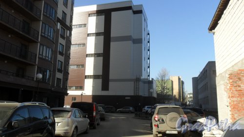 Фермское шоссе, дом 22, корпус 2. Паркинг. Вид здания в сторону улицы Аккуратова. Фото 16 марта 2015 года.