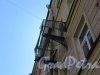 Конная ул., д. 15. Доходный дом. Балкон на фасаде 3-го этажа в современном состоянии. фото май 2018 г.