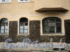 Астраханская ул., д. 23 / Саратовская ул., д. 24. Рустовка первого этажа. Фасад по Астраханской улице. Фото август 2010 г.