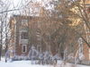 Ул. Пограничника Гарькавого, дом 19. Корпус 1 (справа) и корпус 2 (слева) среди деревьев. Фото февраль 2012 г.