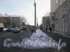 Перспектива ул. Коммуны от Ириновского пр. в сторону Триумфальных пилонов. Фото февраль 2012 г.