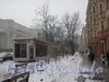 Перспектива пешеходной части чётной стороны ул. Бассейной. Слева первый торговый павильон - дом 22, лит. Д. Фото февраль 2012 г.