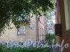 Ул. Танкиста Хрустицкого, дом 66. Общий вид угла дома и ограды между домами 64 и 66. Фото 23 мая 2012 г.