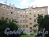 Ул. Швецова, дом 4. Центральная часть фасада здания со стороны ул. Швецова. Фото 25 июня 2012 г.