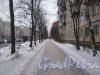 Ул. Руднева, дом 19, корпус 1 (справа) и перспектива пешеходной нечётной стороны ул. Руднева в сторону Придорожной аллеи. Фото 25 января 2013 г.