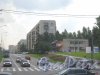 Ул. Лёни Голикова, дом 7 (справа в центре Фото) и перспектива улицы от пр. Стачек в сторону пр. Ветеранов. Фото 5 августа 2013 г.