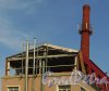 Уральская улица, дом 19, корпус 9, литера Ж. Строительство дополнительного этажа. Фото 18 мая 2014 года.