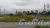 Улица Михаила Дудина. Панорама улицы от проспекта Энгельса в сторону станции метро "Парнас". Фото 16 августа 2015 года.