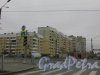 Улица Савушкина, дом 107, корпус 1, литера А. 9-этажный корпус со стороны Стародеревенской улицы. Фото 2 апреля 2016 года.